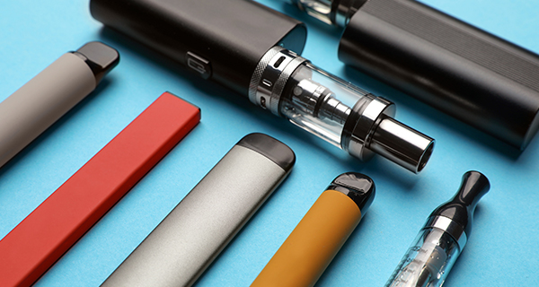 disposable vapes on a blue background