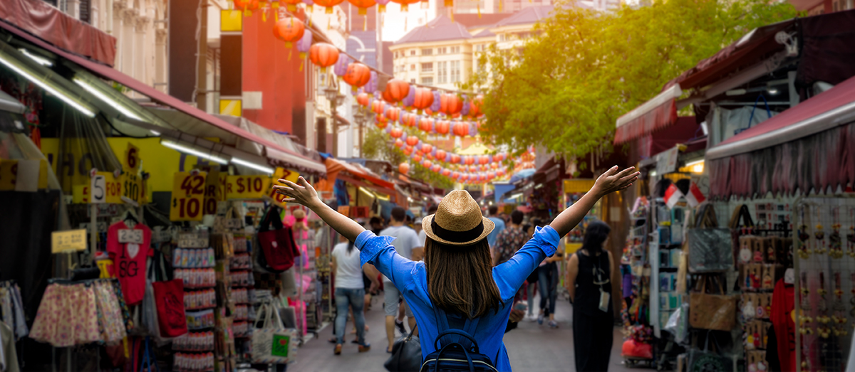 Student at an open air bazaar