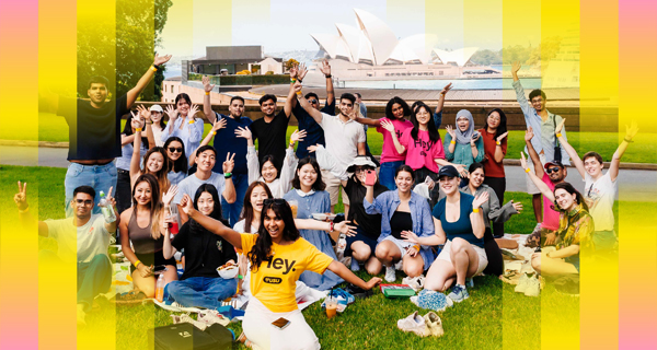 Students on USU day trip in front of Opera House