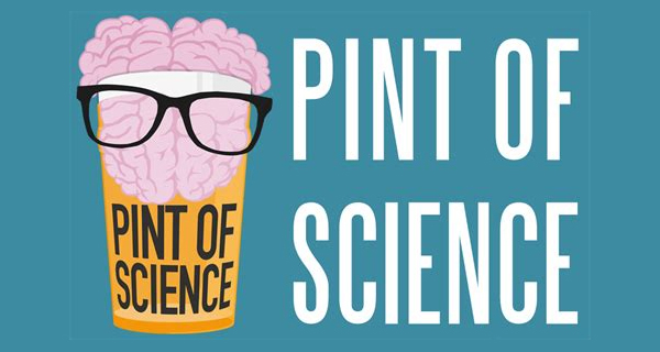 A cartoon pint glass filled with a brain and wearing glasses is labeled 