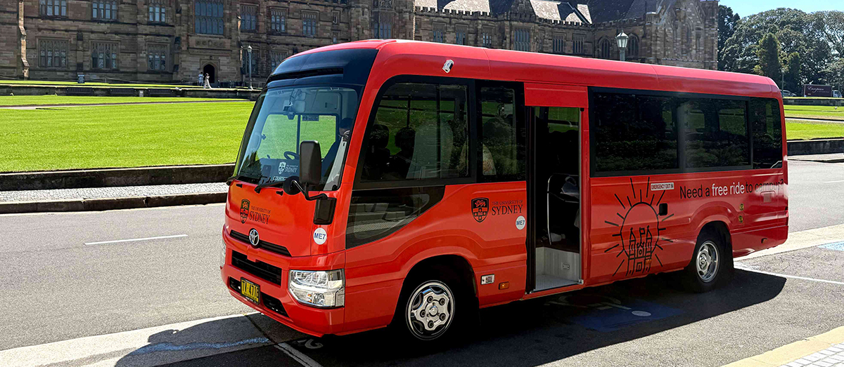 Campus bus out the front of Fisher Library