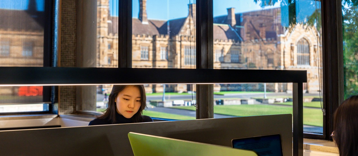 Student studying in Fisher Library