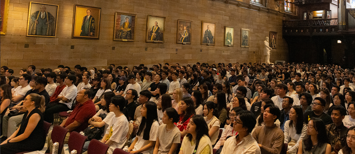 Group of students sitting in the Great Hall