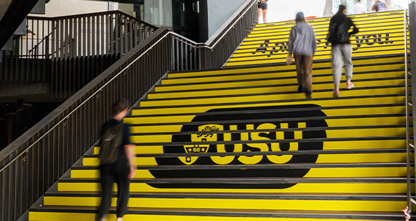 USU-branded stairs at JFR Plaza