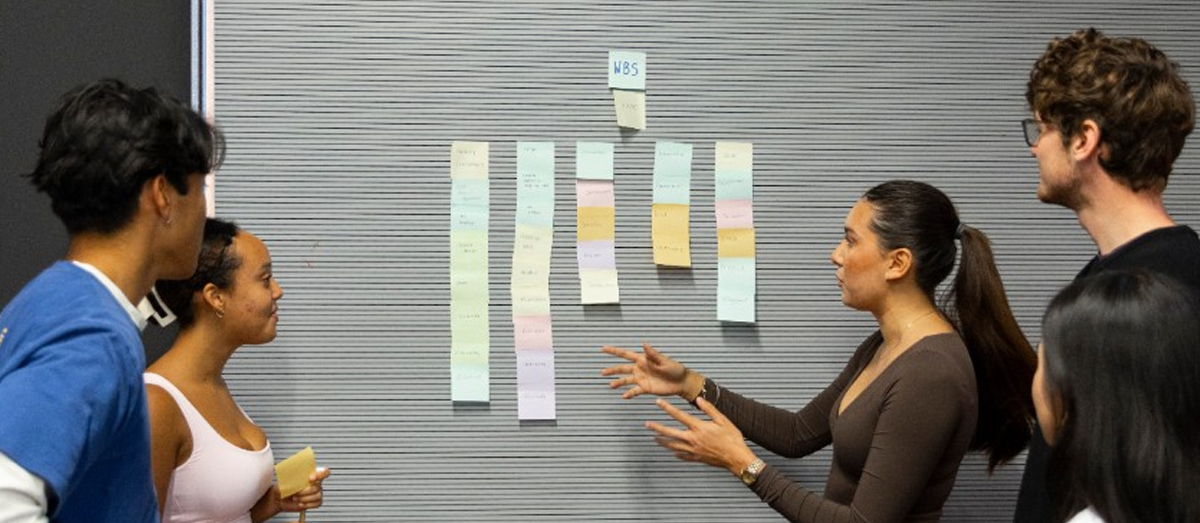 Student studying with sticky notes