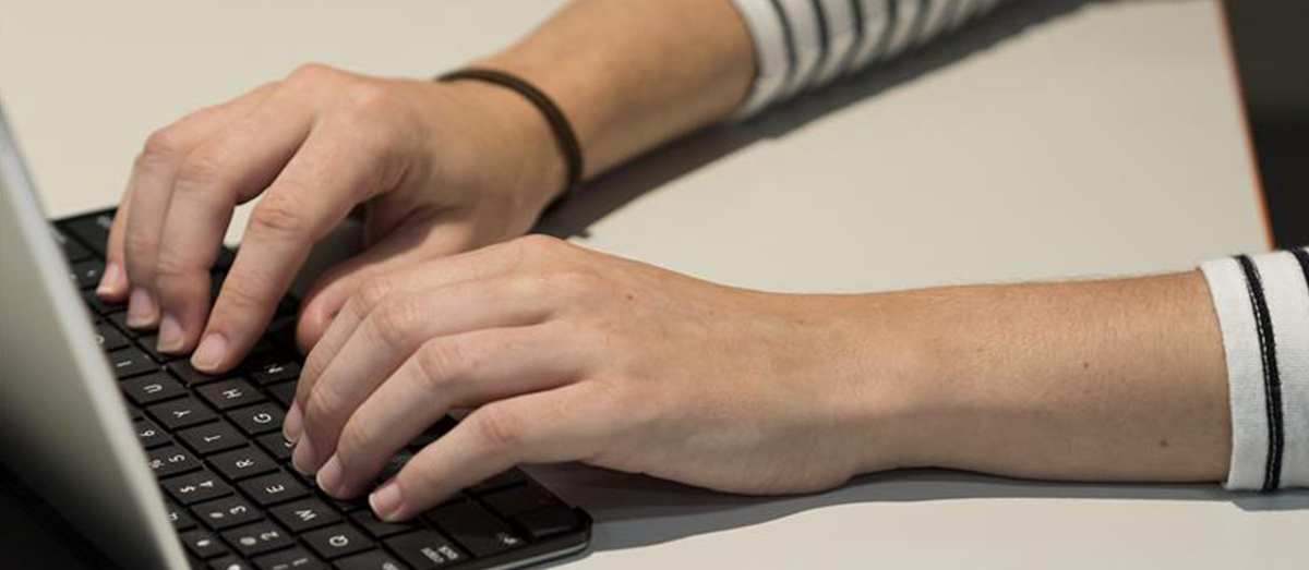 Fingers on a keyboard