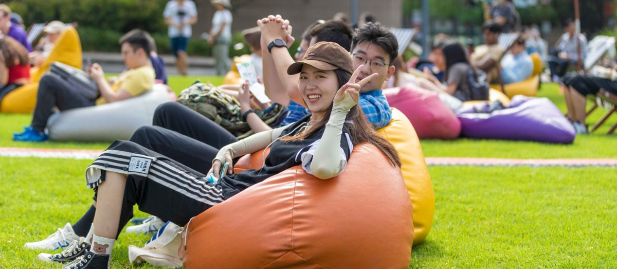 Students sitting on beanbags at Welcome