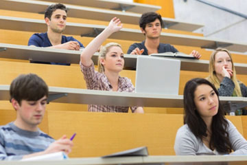 Attentive students in a lecture theatre