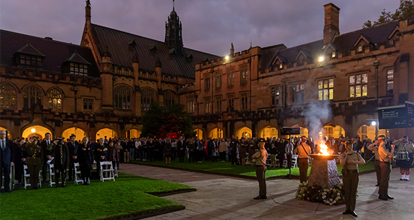 A crowd of people at the ANZAC day dawn service in the Quad.