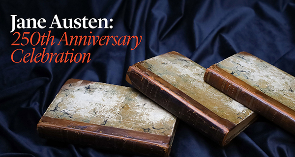 Three vintage books with worn covers rest on dark blue fabric. Text reads 