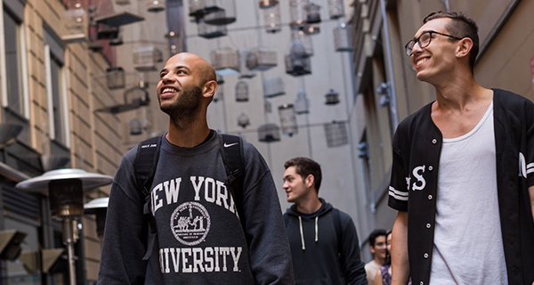 Student wearing an NYU jumper