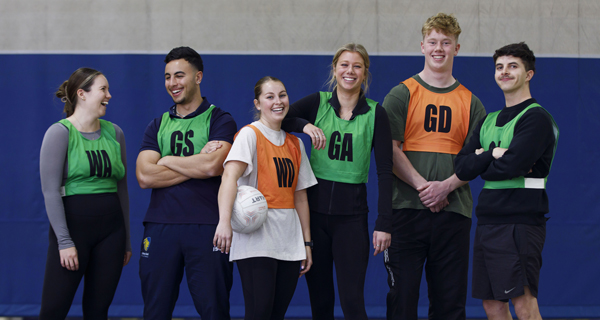 A group of students playing social netball.