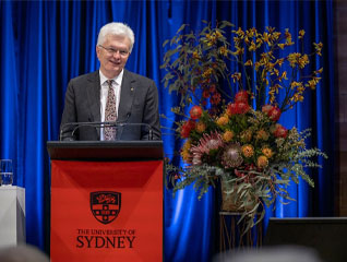 Professor Glyn Davis on stage