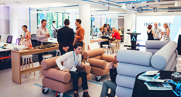 People networking at an INCUBATE event.