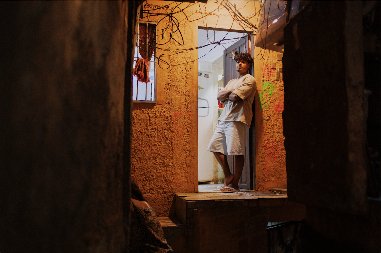 Luiz outside his godmother's home in Pavão-Pavãozinho. Photo credit: The University of Sydney/Rodrigo Oliveira