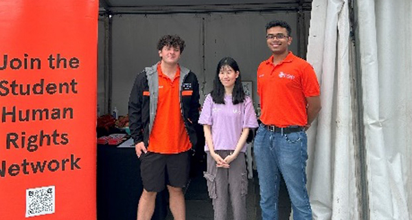 Students at the Human Rights Network stall at Welcome