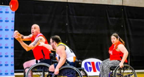 People participating in wheelchair AFL