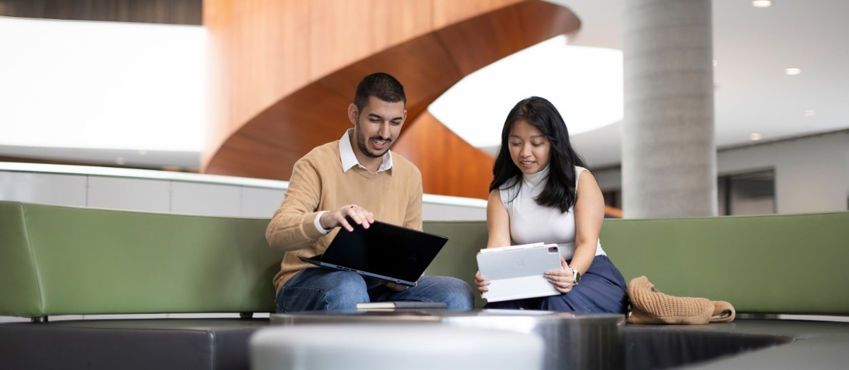 two students studying at the Belinda Hutchison Building