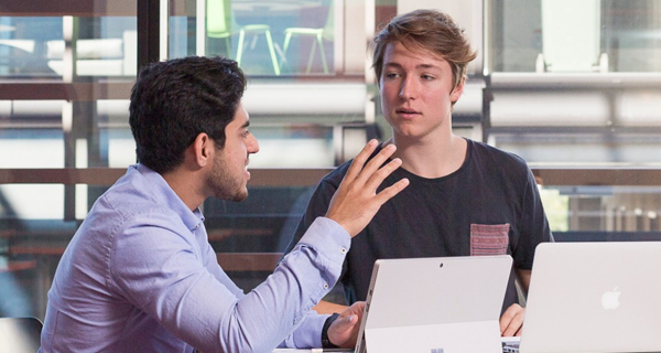 Two business students chatting