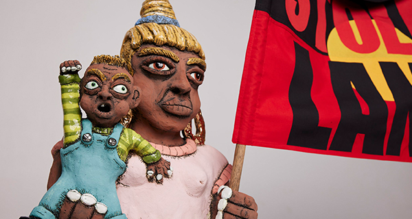 Billy Bain, Stolen Land (detail), 2024. Ceramic sculpture with underglaze, glaze and metallic lustres, fabric and wood.   
