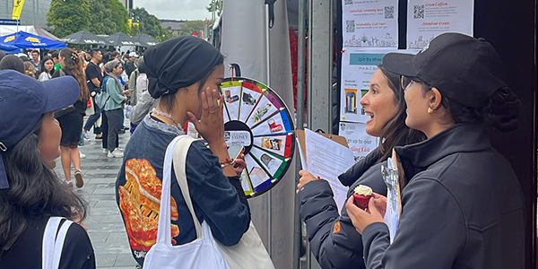 Students at a stall during Welcome Week