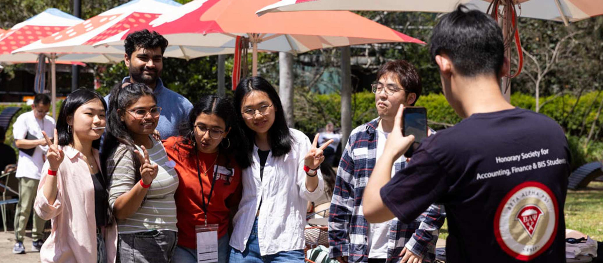 Students being photographed on campus at Welcome Fest