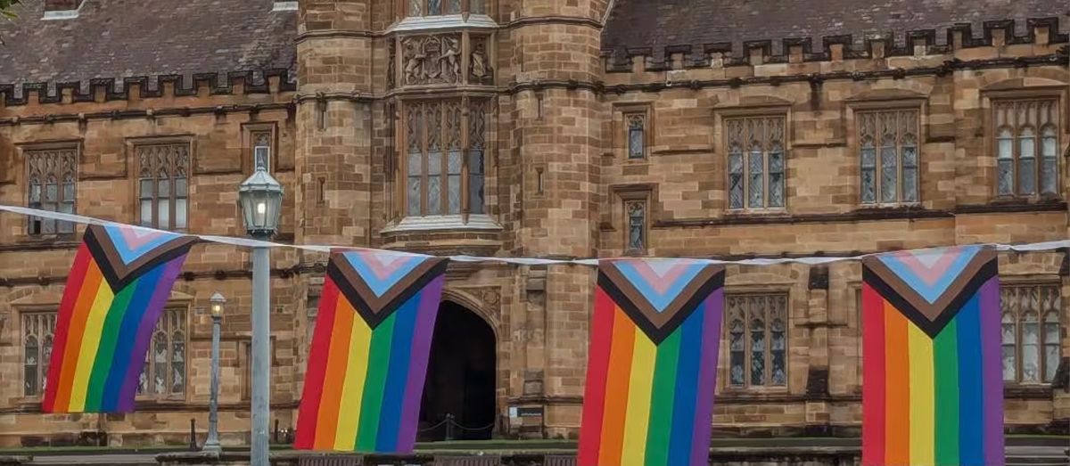 The LGBTQI+ flag flying on campus